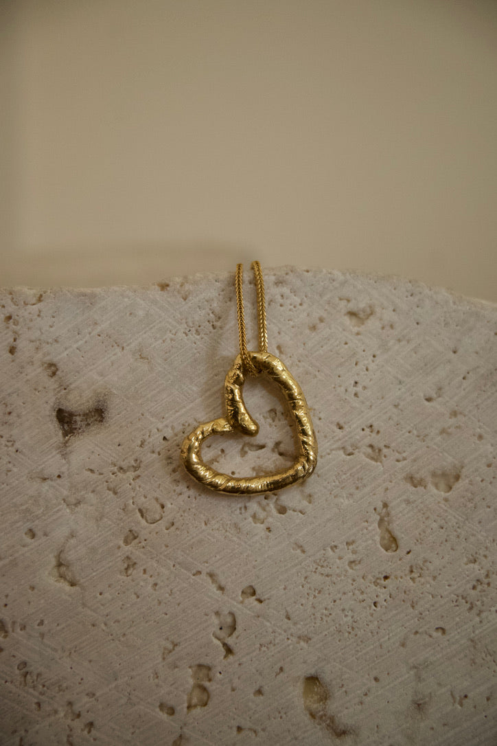 Infiniti Tilt Gold Pendant